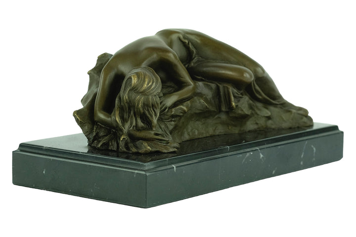 Bronze sculpture of a female sleeping on a rock - inspired by Rodin