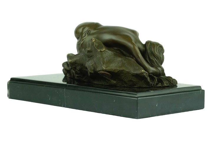 Bronze sculpture of a female sleeping on a rock - inspired by Rodin