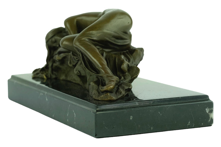 Bronze sculpture of a female sleeping on a rock - inspired by Rodin