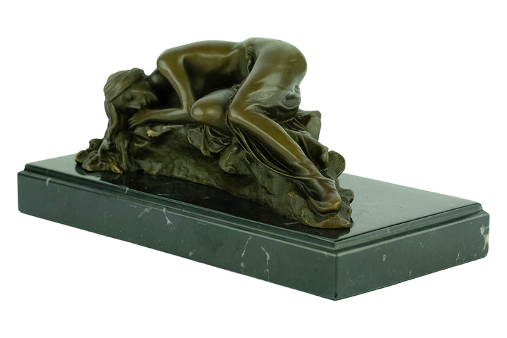 Bronze sculpture of a female sleeping on a rock - inspired by Rodin