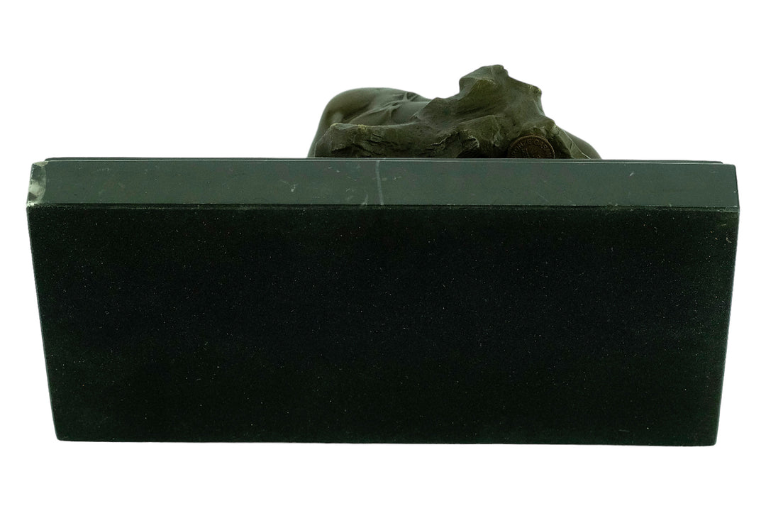 Bronze sculpture of a female sleeping on a rock - inspired by Rodin