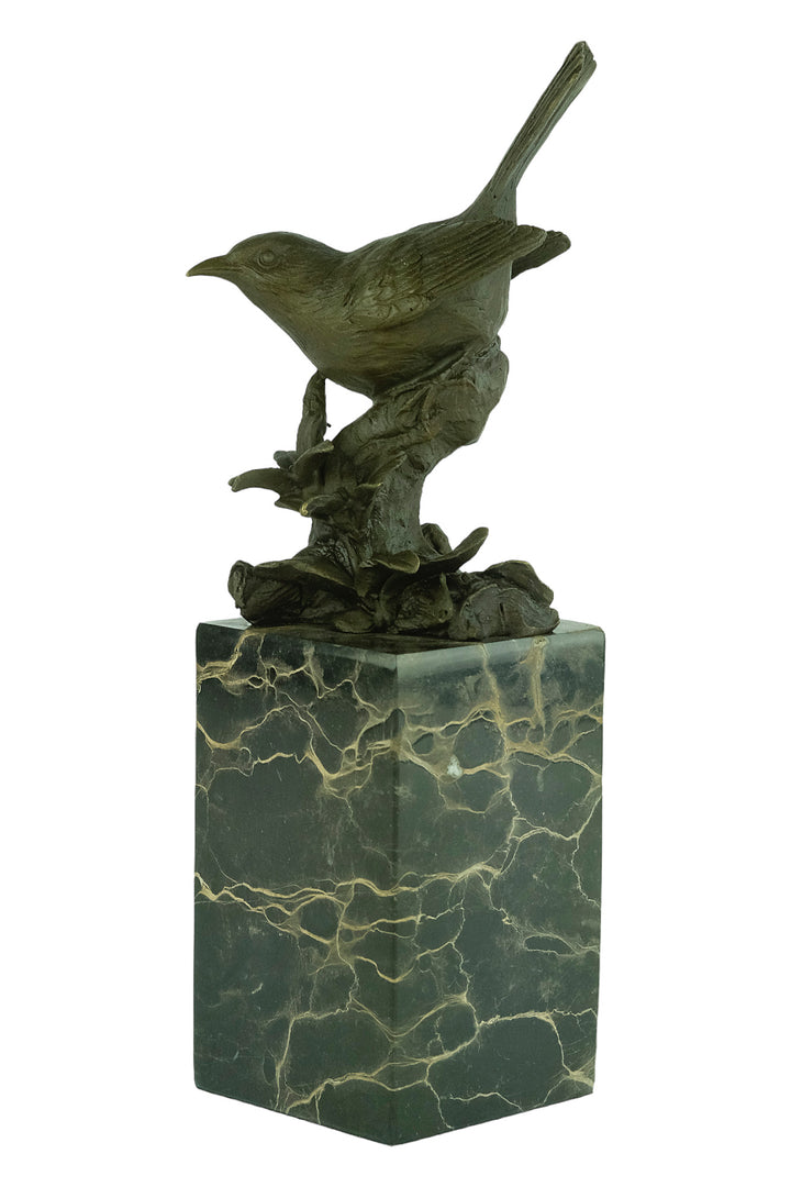 Bronze sculpture of a warbler bird sitting on a branch