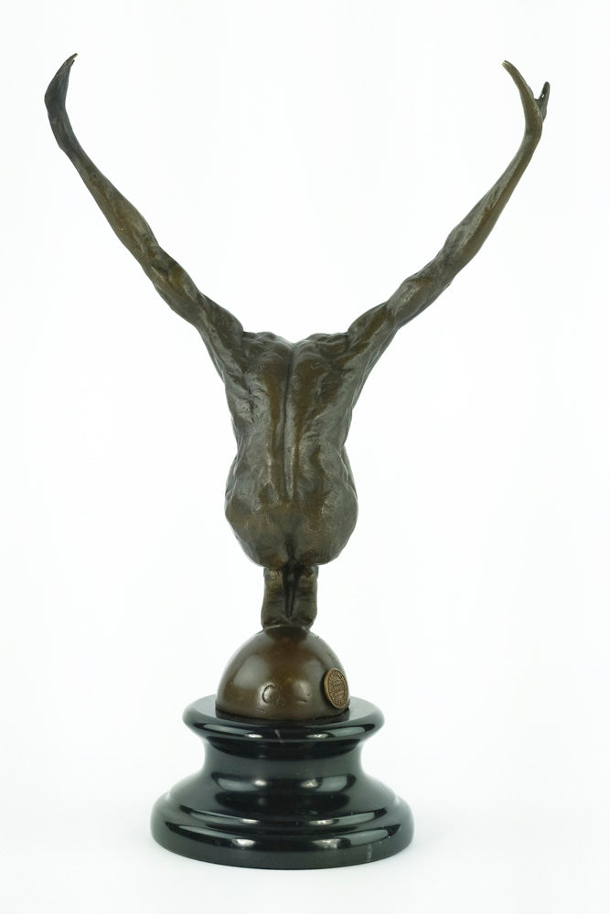 Bronze sculpture of a male with outstretched arms
