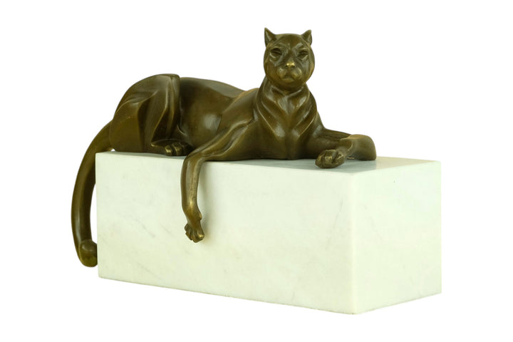 Bronze sculpture of a cubist style panther lying on a white marble base
