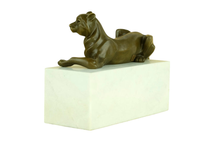 Bronze sculpture of a cubist style panther lying on a white marble base