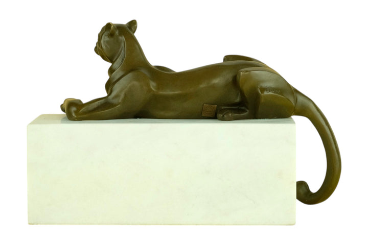 Bronze sculpture of a cubist style panther lying on a white marble base