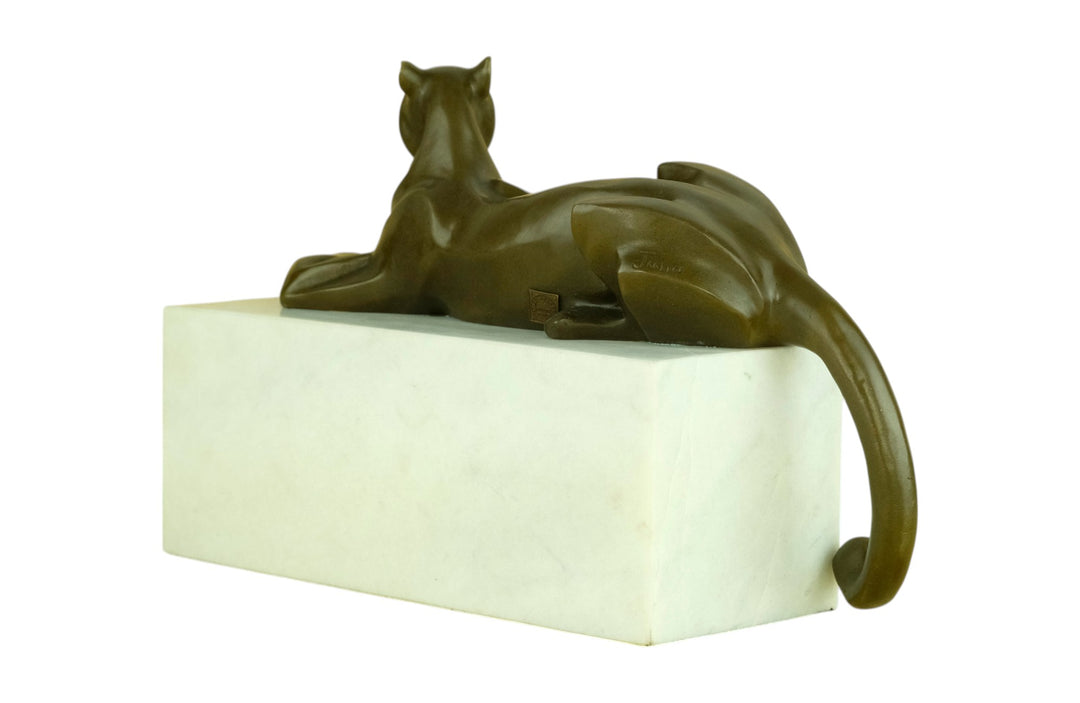 Bronze sculpture of a cubist style panther lying on a white marble base
