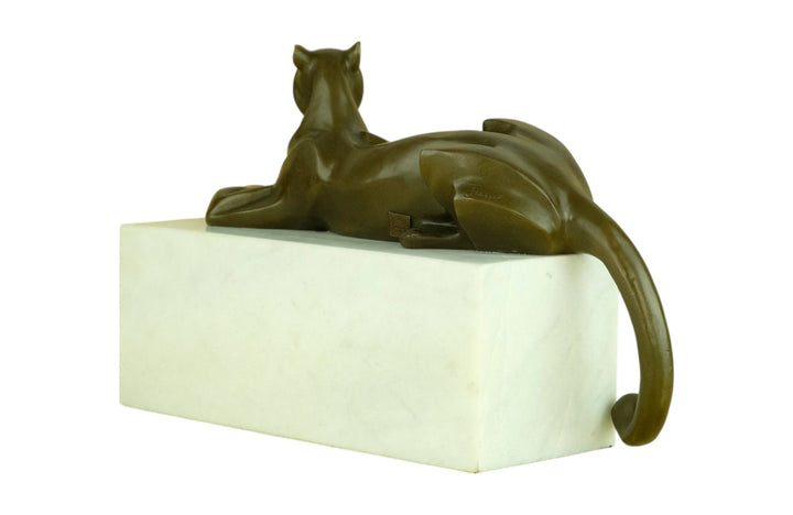 Bronze sculpture of a cubist style panther lying on a white marble base