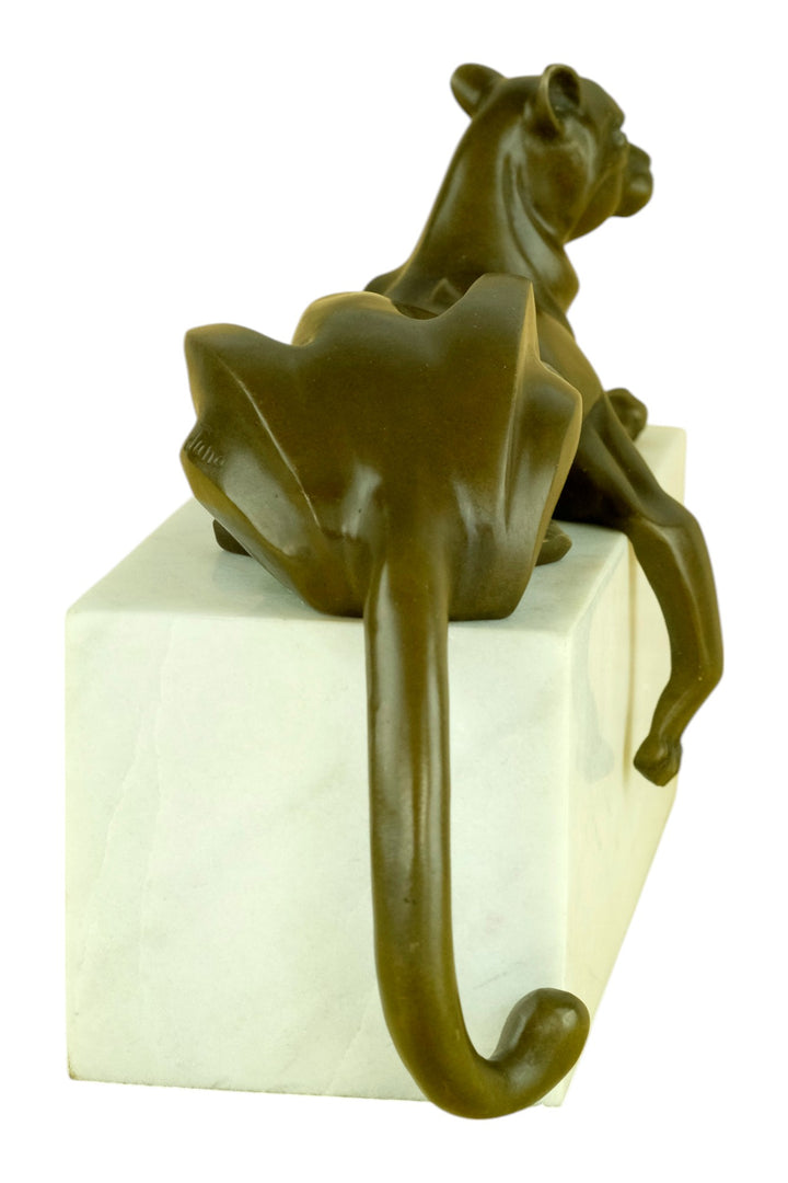 Bronze sculpture of a cubist style panther lying on a white marble base