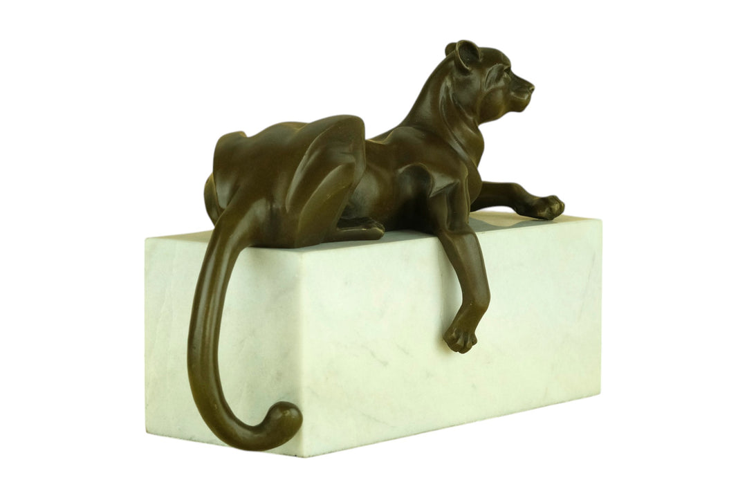Bronze sculpture of a cubist style panther lying on a white marble base