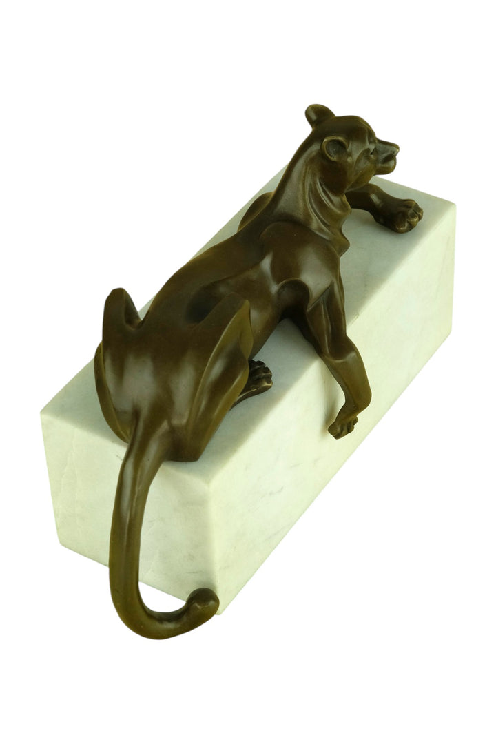 Bronze sculpture of a cubist style panther lying on a white marble base