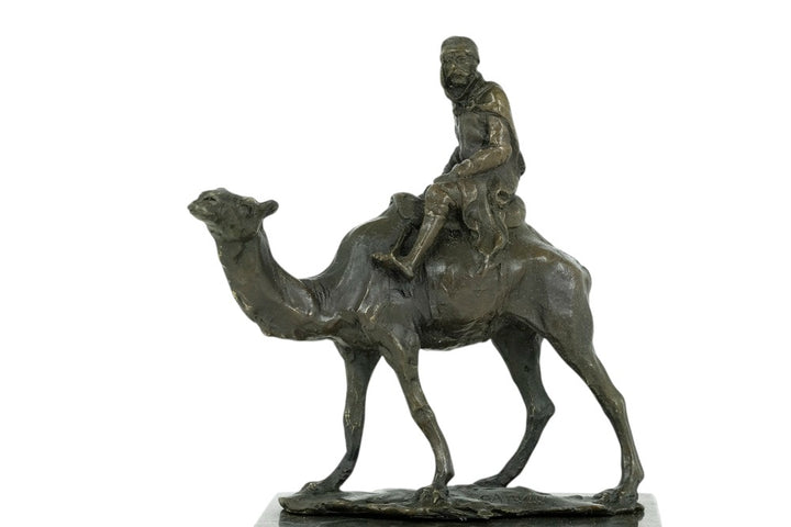 Bronze sculpture of a camel with bedouin rider
