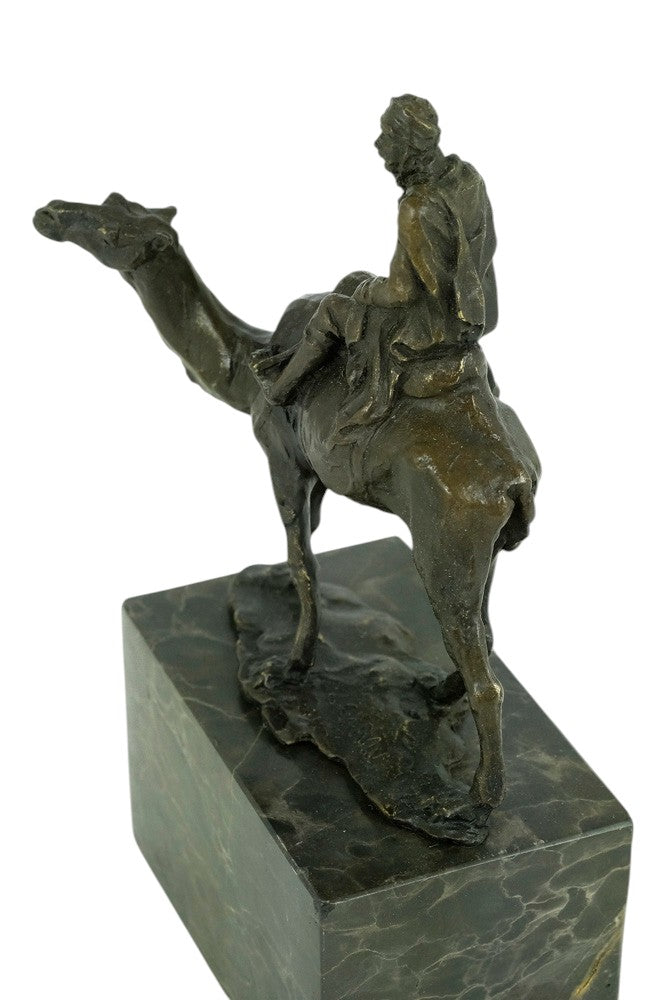 Bronze sculpture of a camel with bedouin rider