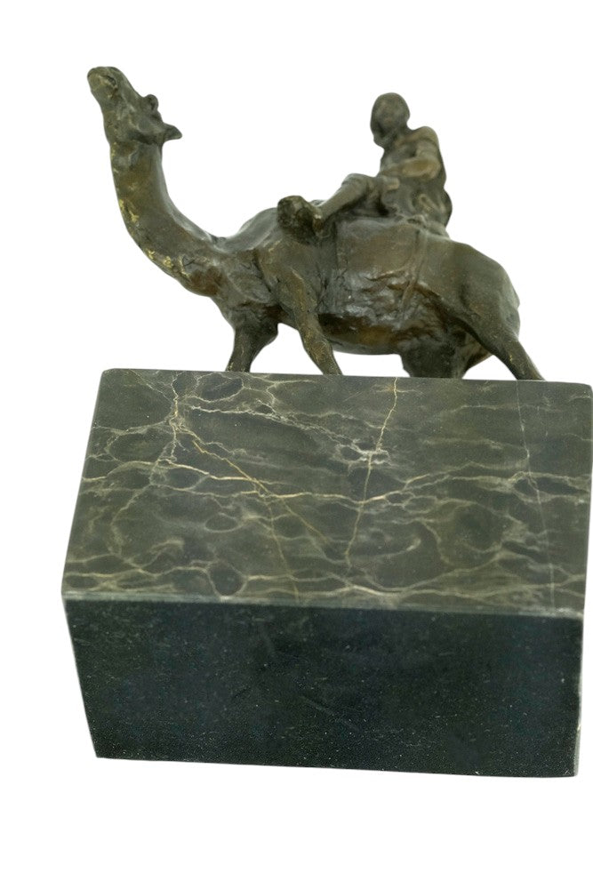 Bronze sculpture of a camel with bedouin rider