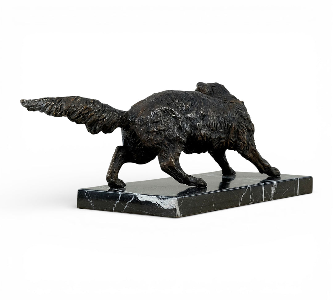 Bronze sculpture of a wiley fox