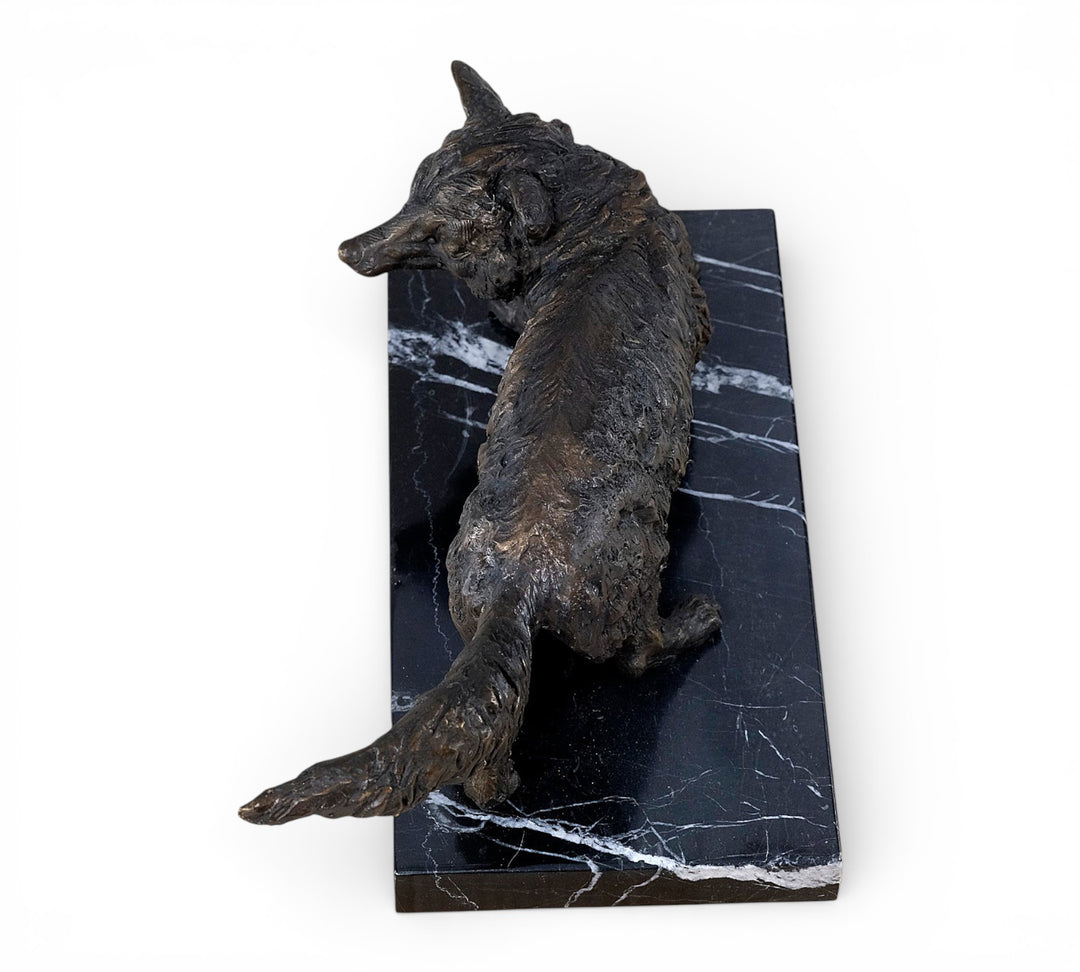 Bronze sculpture of a wiley fox