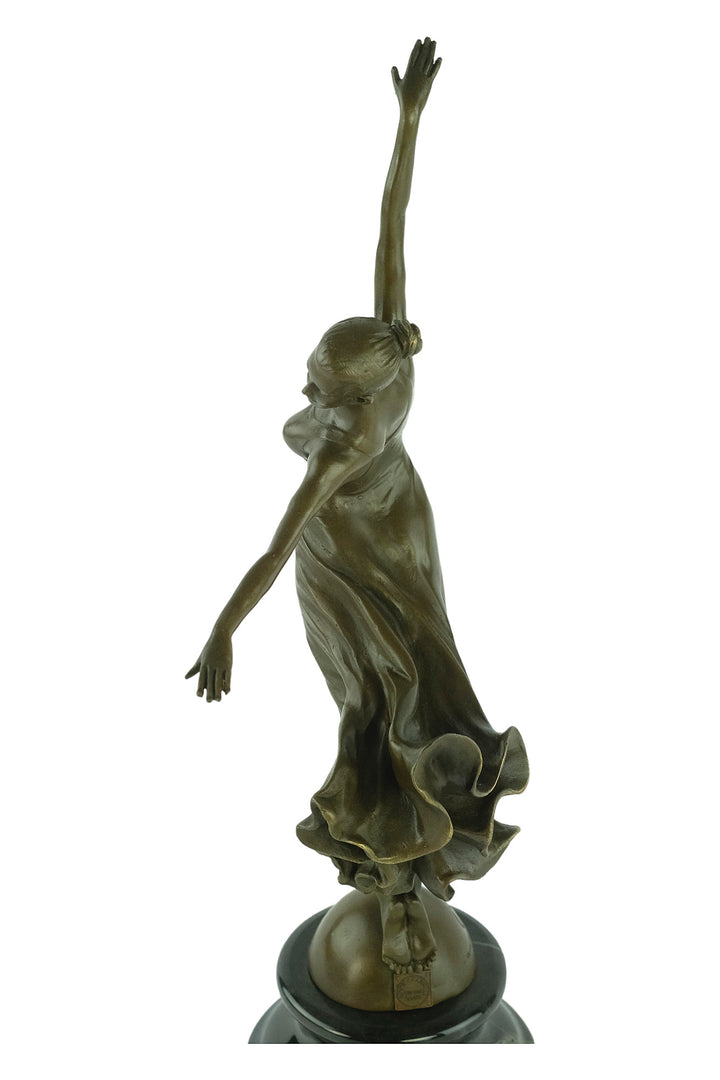 Bronze sculpture of a female dancing gracefully