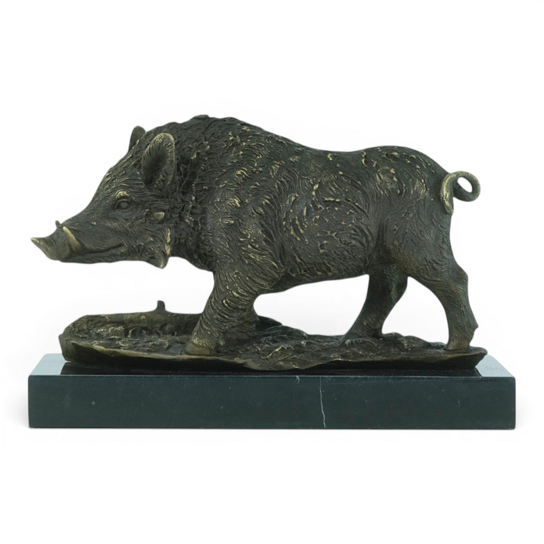 Bronze sculpture of a wild boar on a marble plateau
