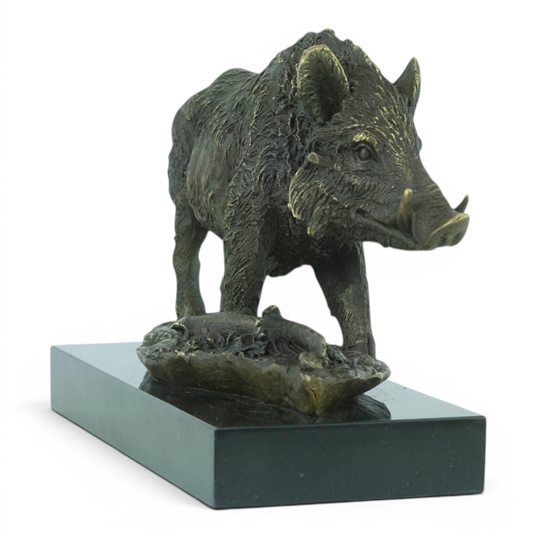 Bronze sculpture of a wild boar on a marble plateau