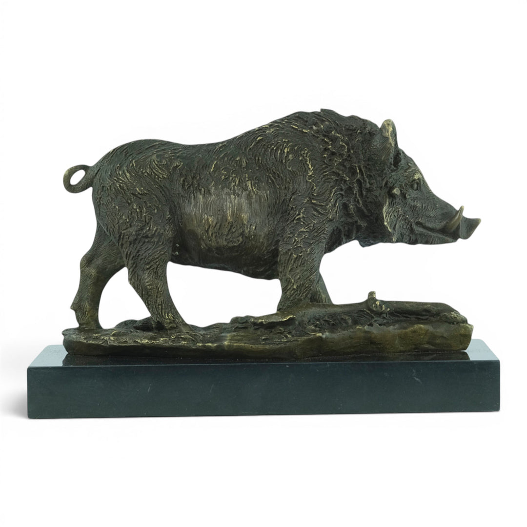 Bronze sculpture of a wild boar on a marble plateau