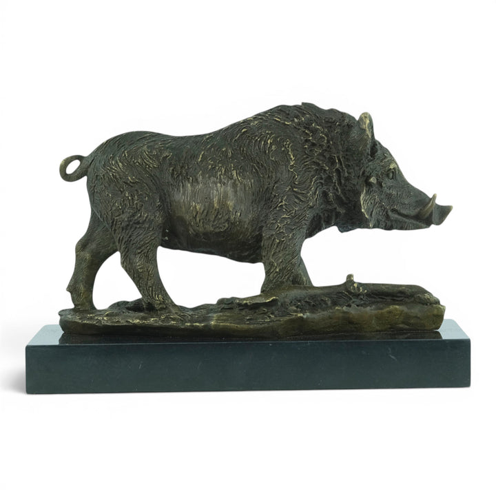 Bronze sculpture of a wild boar on a marble plateau