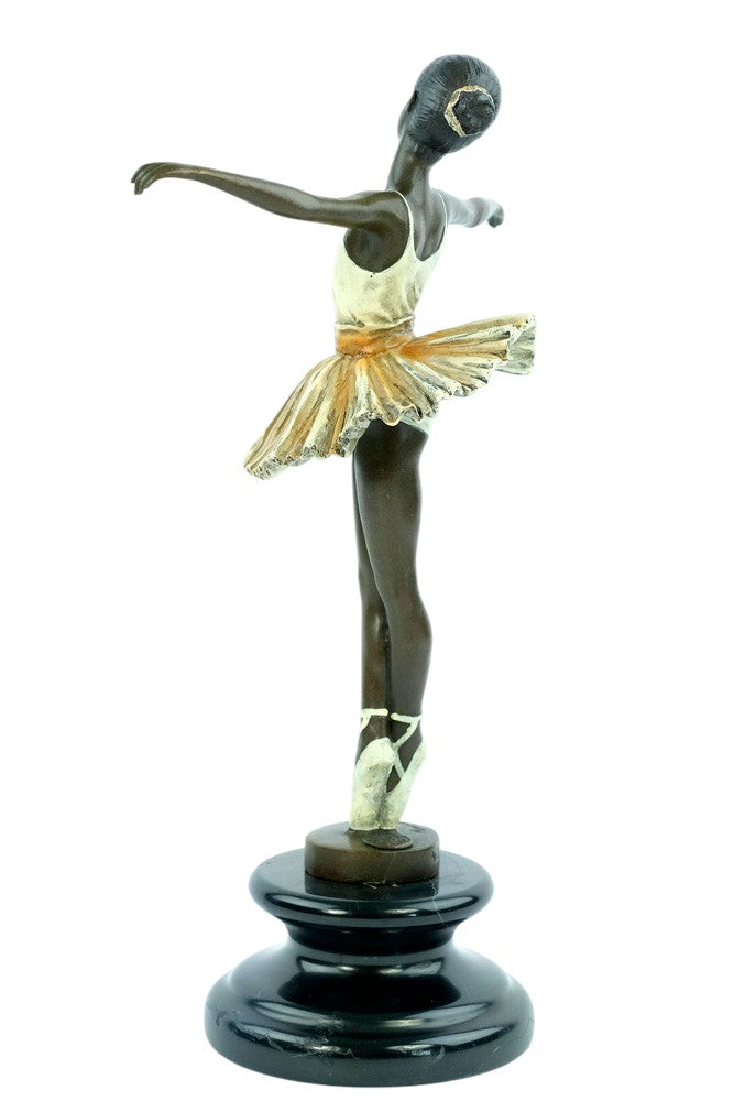 Bronze sculpture of a ballerina standing tip-toe wearing a white tutu