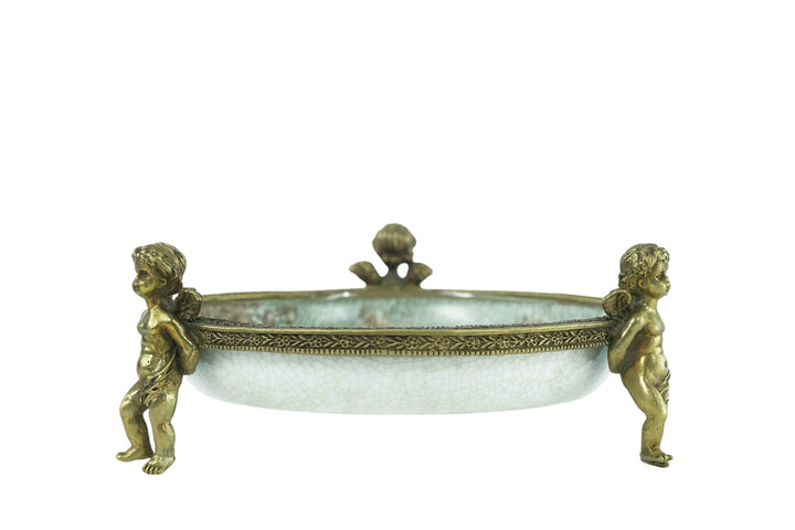 Porcelain bowl carried by three bronze cherubs