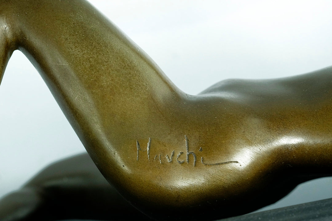 Bronze sculpture of a reclining sensual female nude