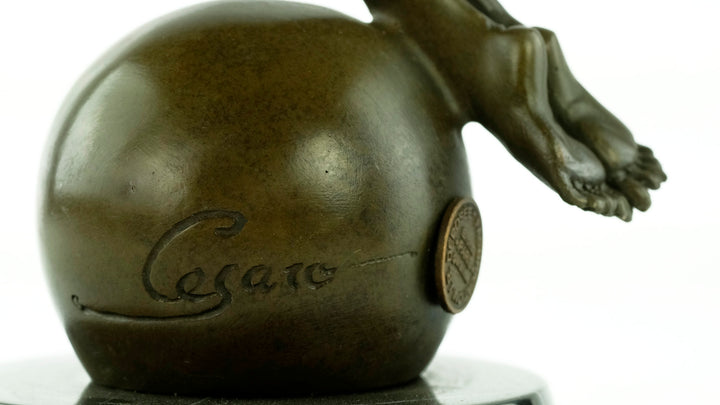 Bronze sculpture of a winged female in rising motion