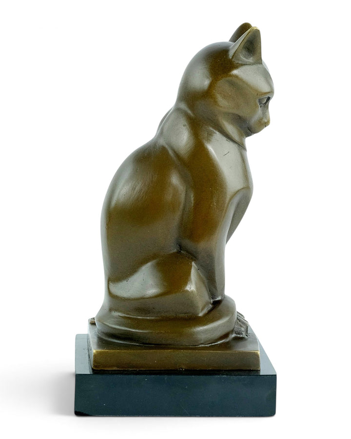 Bronze sculpture of a sitting cat in cubist style