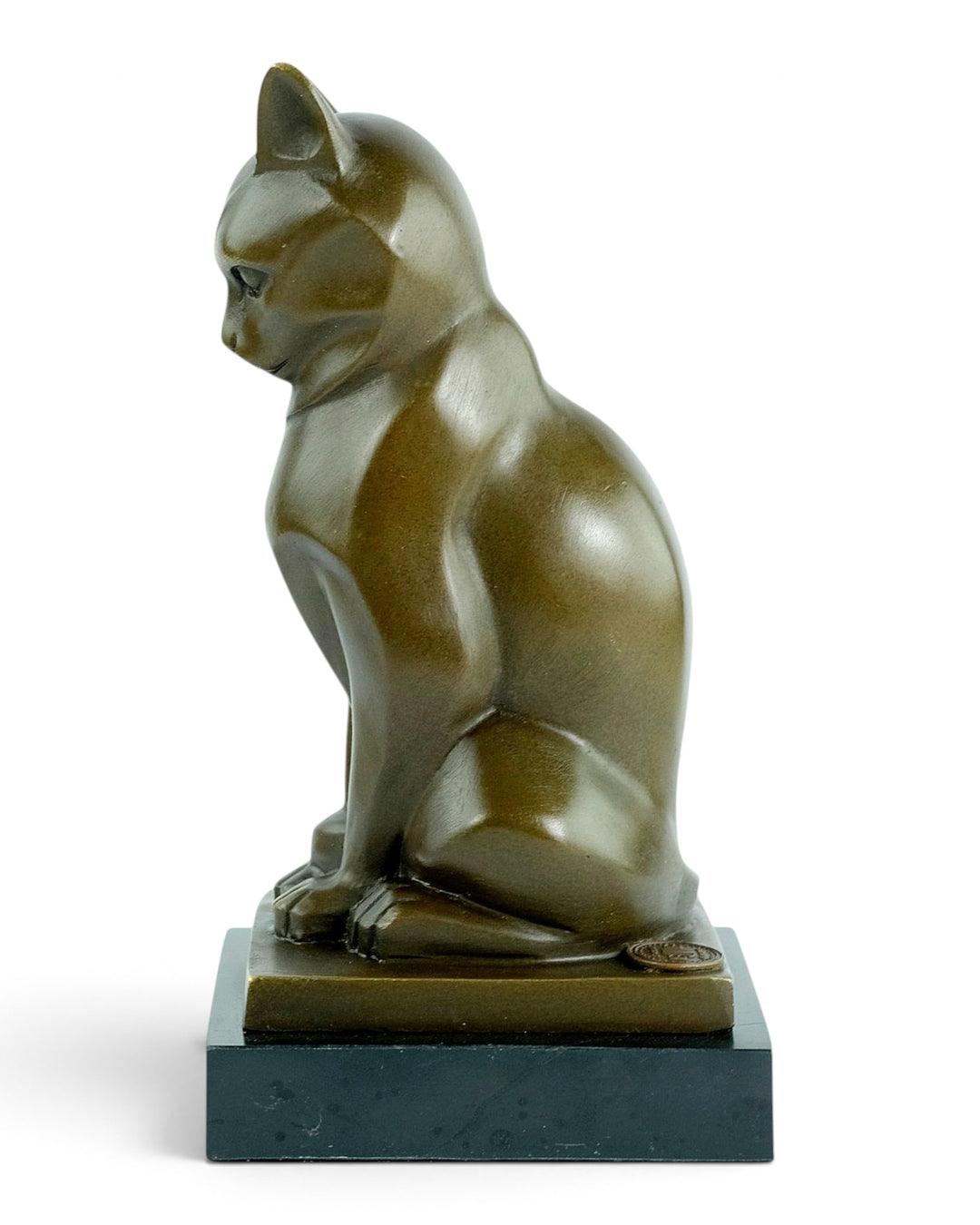 Bronze sculpture of a sitting cat in cubist style