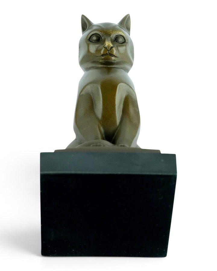 Bronze sculpture of a sitting cat in cubist style