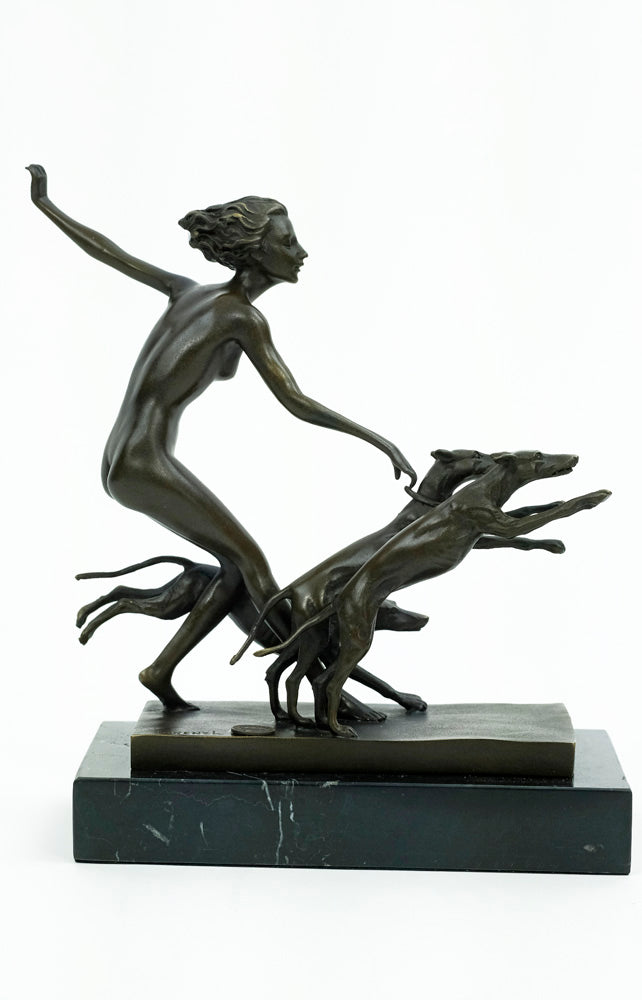 Bronze sculpture of a female running with three dogs