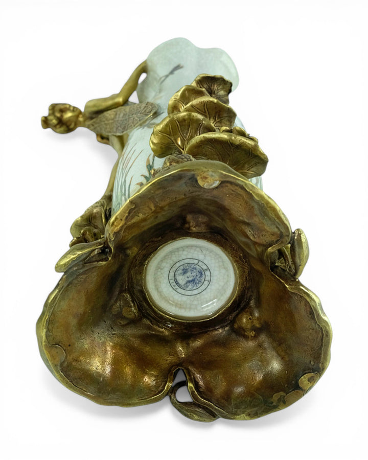 Porcelain vase with floral motifs and bronze decoration
