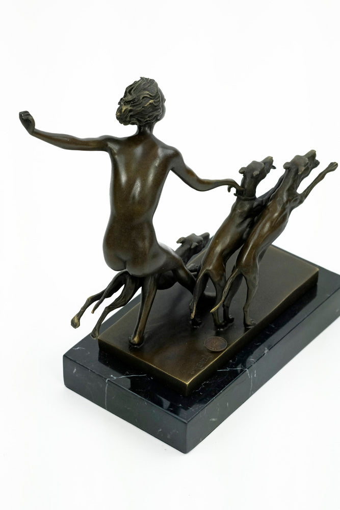 Bronze sculpture of a female running with three dogs