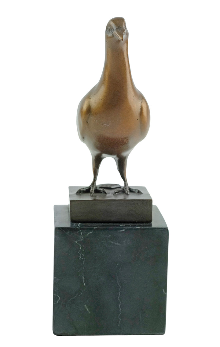 Bronze sculpture of a standing pigeon
