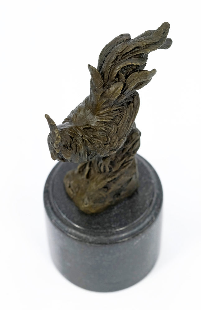 Bronze sculpture of a rooster