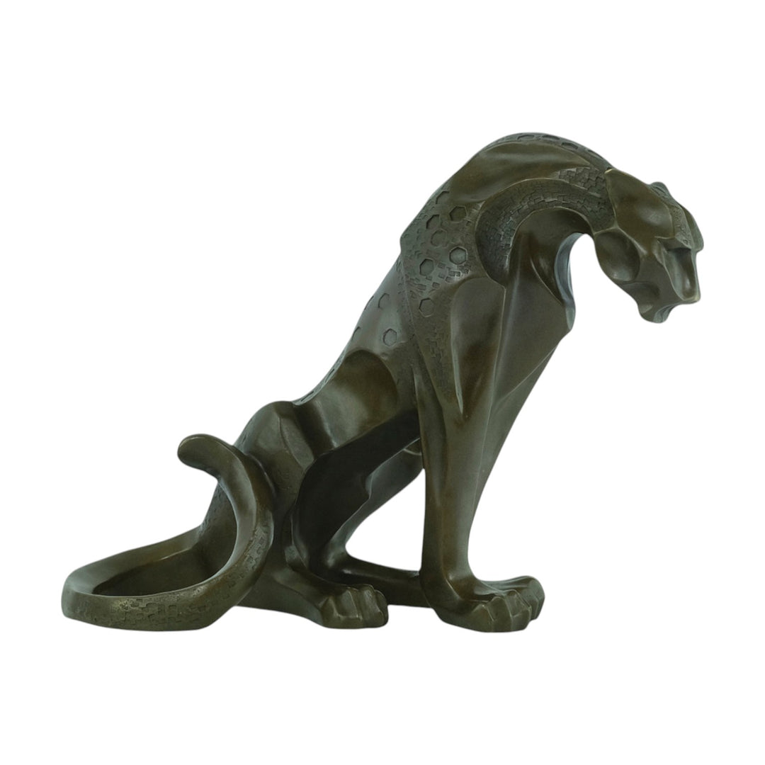 Bronze sculpture of a sitting jaguar in cubist style
