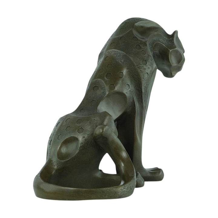 Bronze sculpture of a sitting jaguar in cubist style