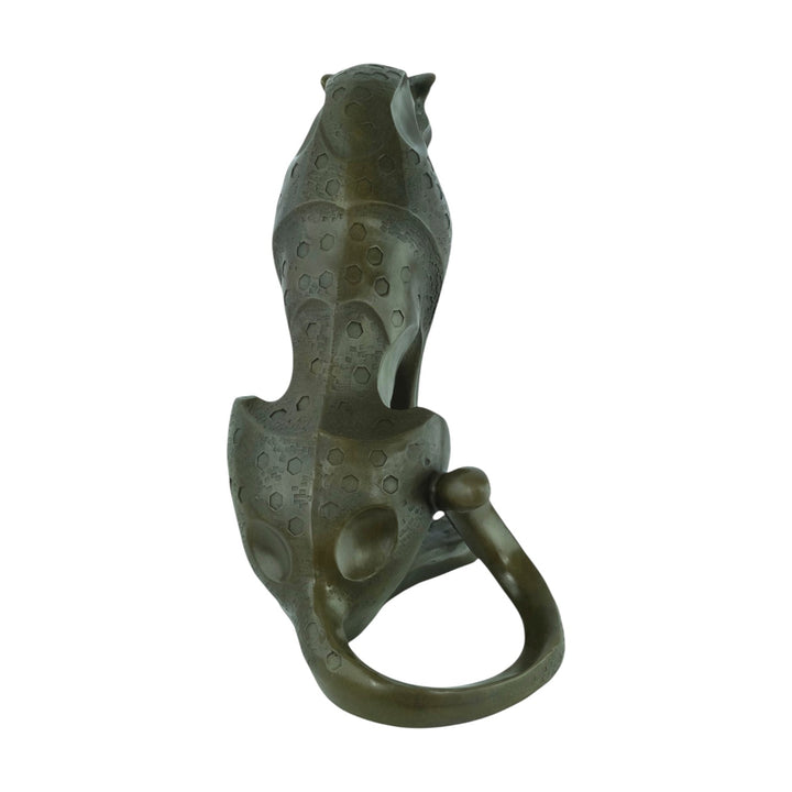 Bronze sculpture of a sitting jaguar in cubist style