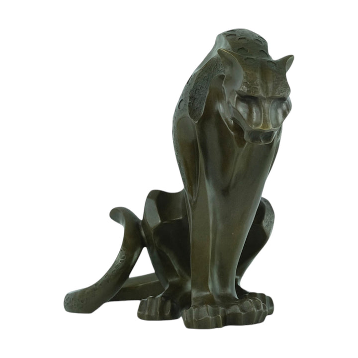 Bronze sculpture of a sitting jaguar in cubist style