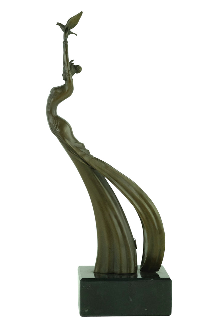 Modern bronze sculpture of a female releasing a bird