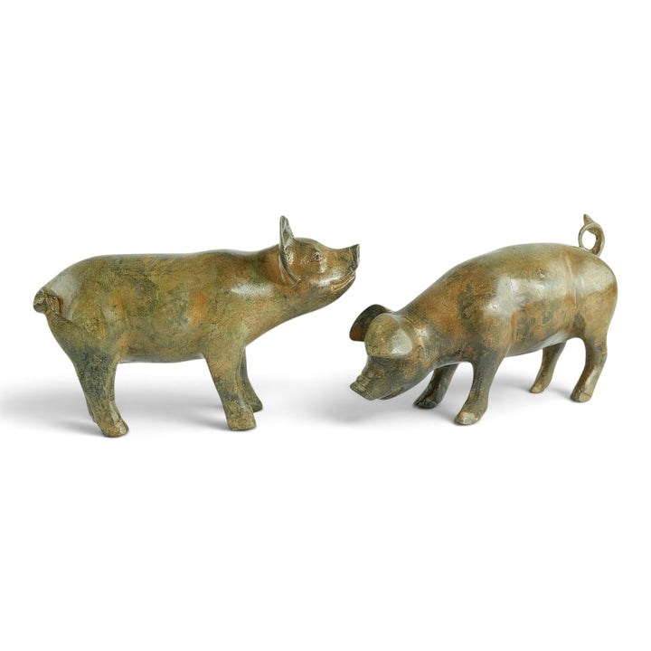 Paar bronzen biggen door Pierre Chenet