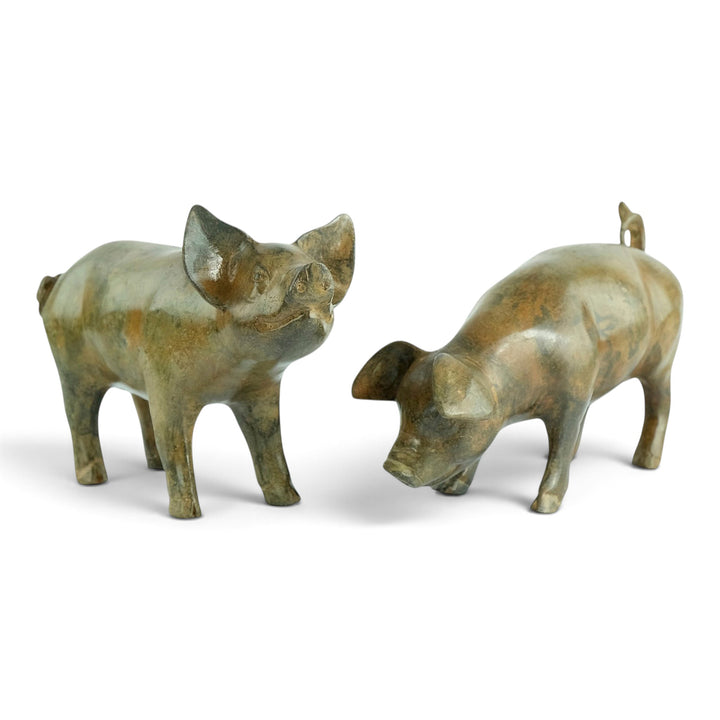 Paar bronzen biggen door Pierre Chenet