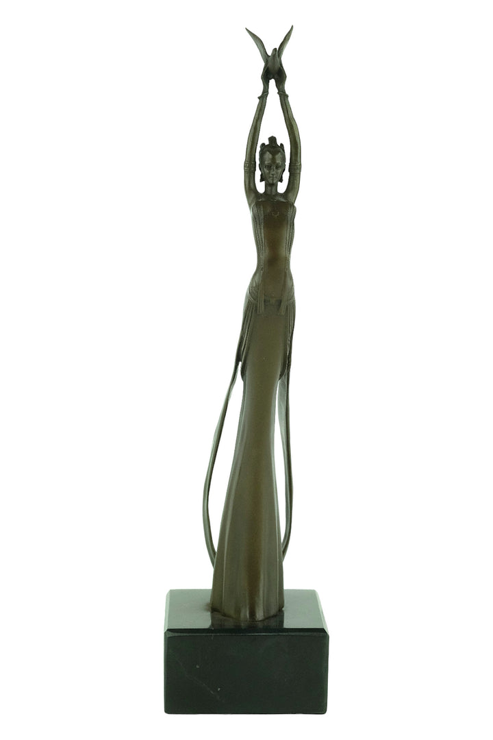Modern bronze sculpture of a female releasing a bird