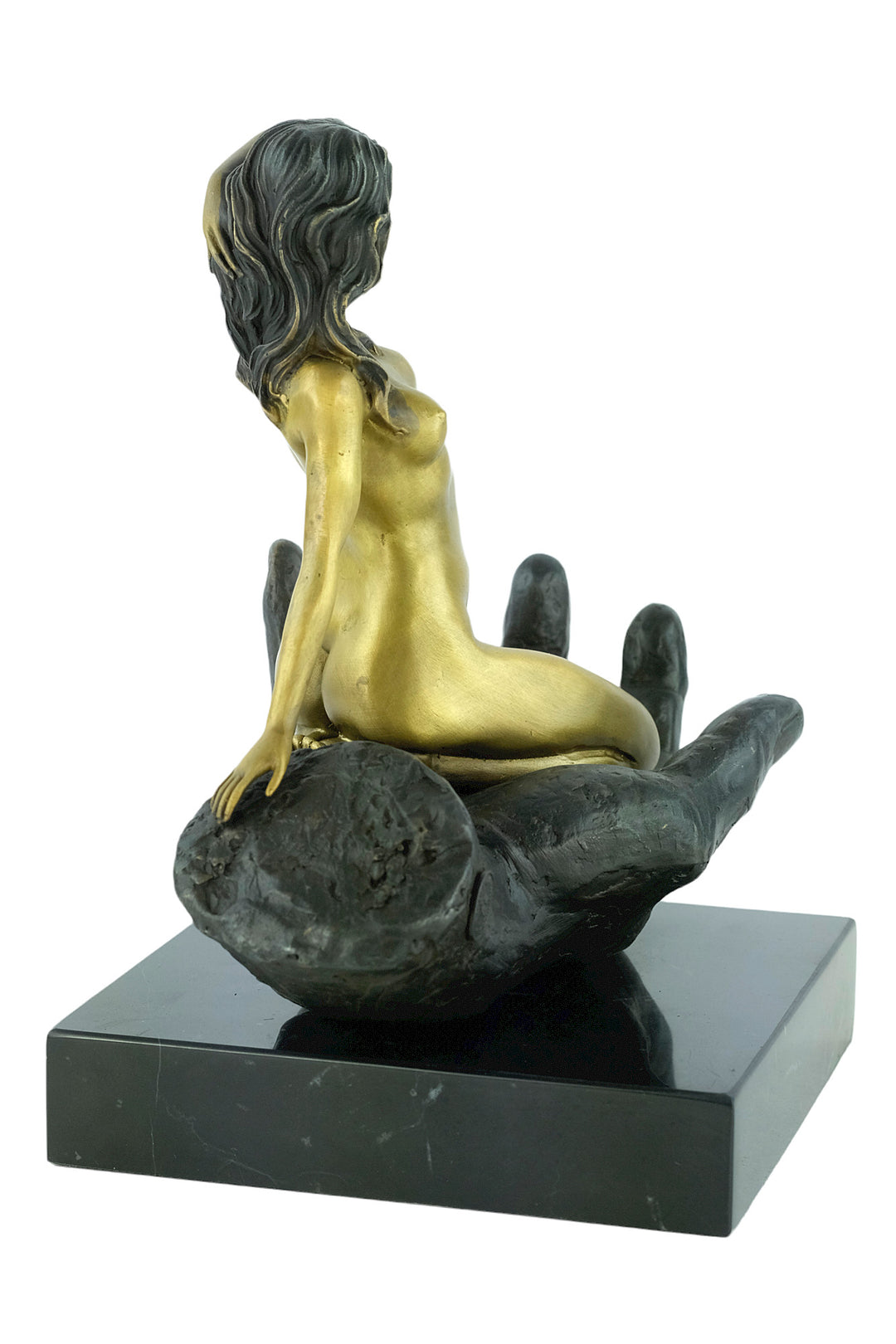 Modern bronze sculpture of a female sitting in a hand