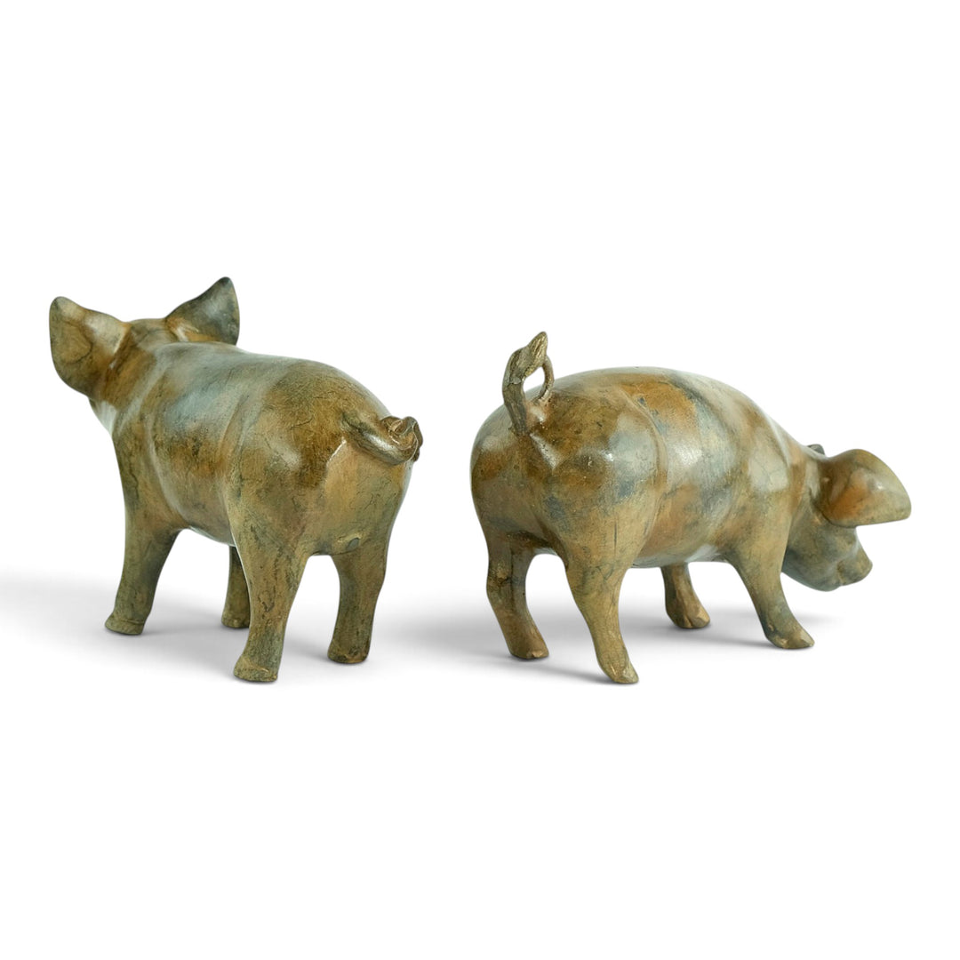 Paar bronzen biggen door Pierre Chenet