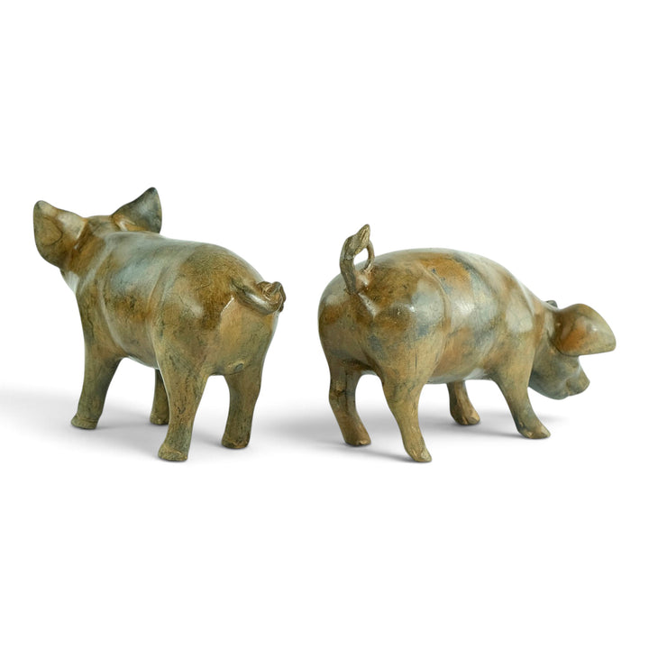 Paar bronzen biggen door Pierre Chenet