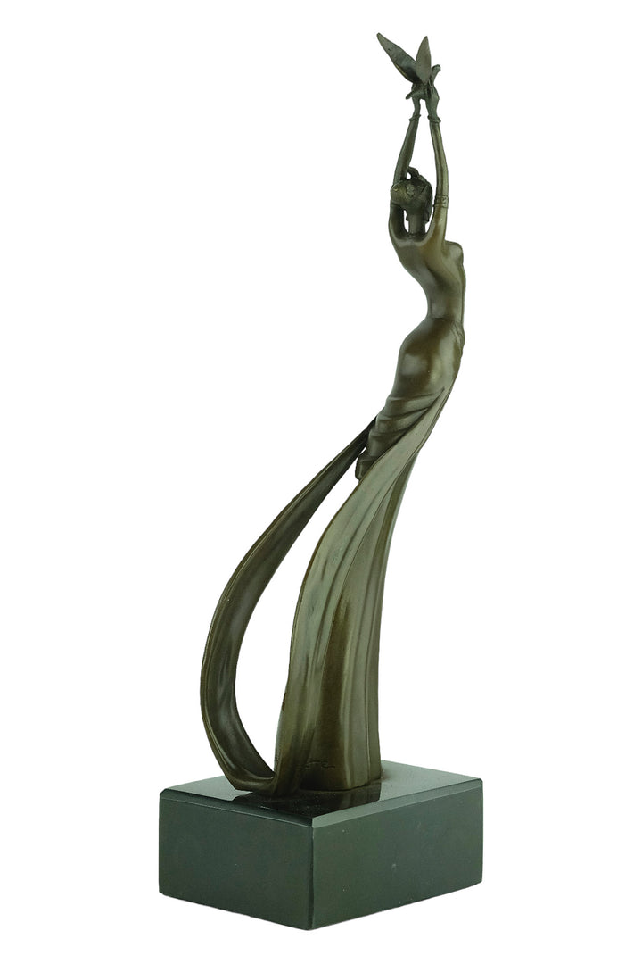 Modern bronze sculpture of a female releasing a bird