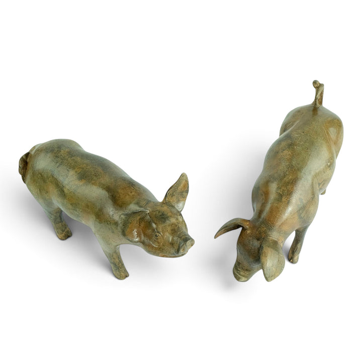 Paar bronzen biggen door Pierre Chenet